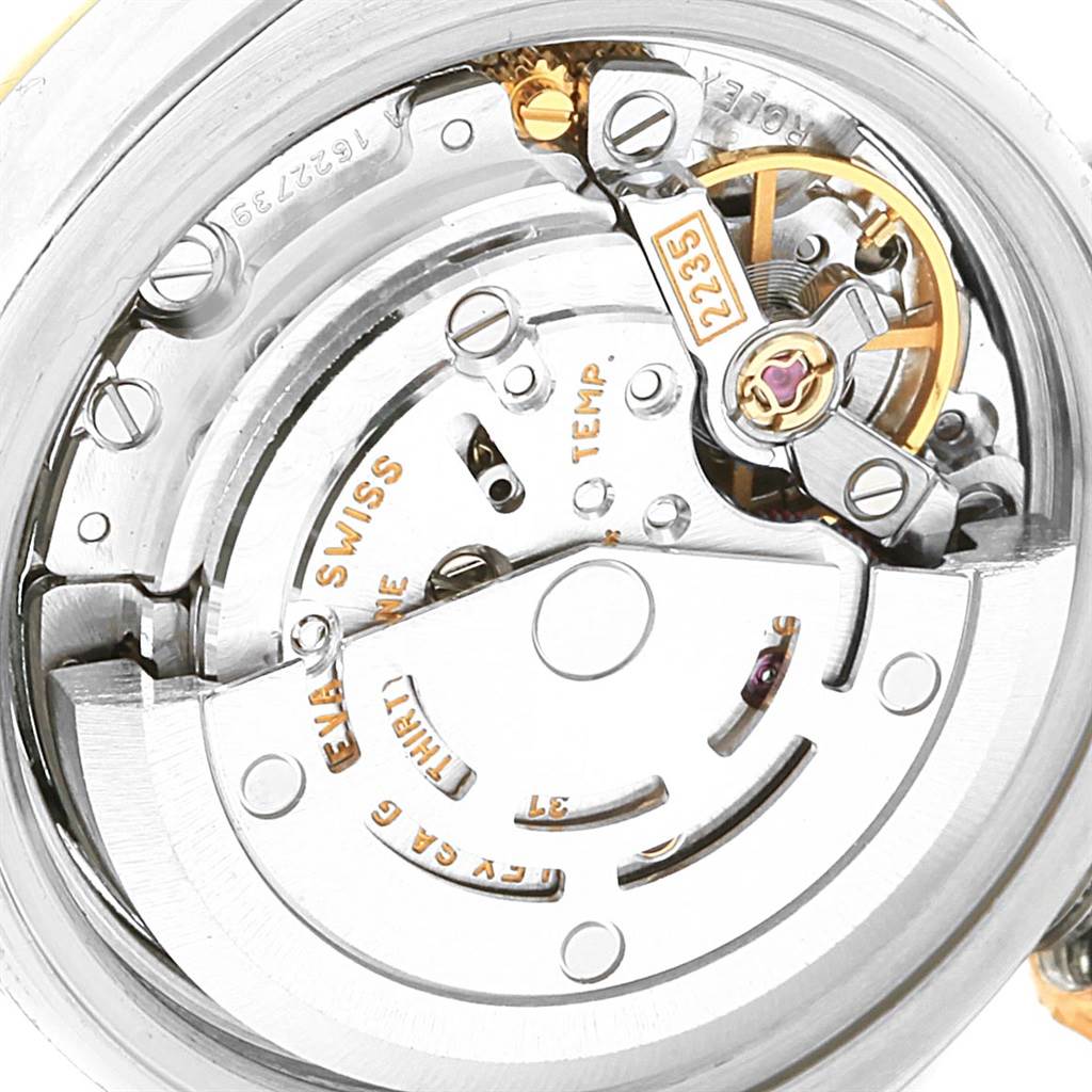 The image shows the internal mechanism and movement of a Rolex Datejust 179173 Women's Steel and Gold (two tone) Champagne Dial 179173 Women's Steel and Gold (two tone) Champagne Dial watch viewed from the back.