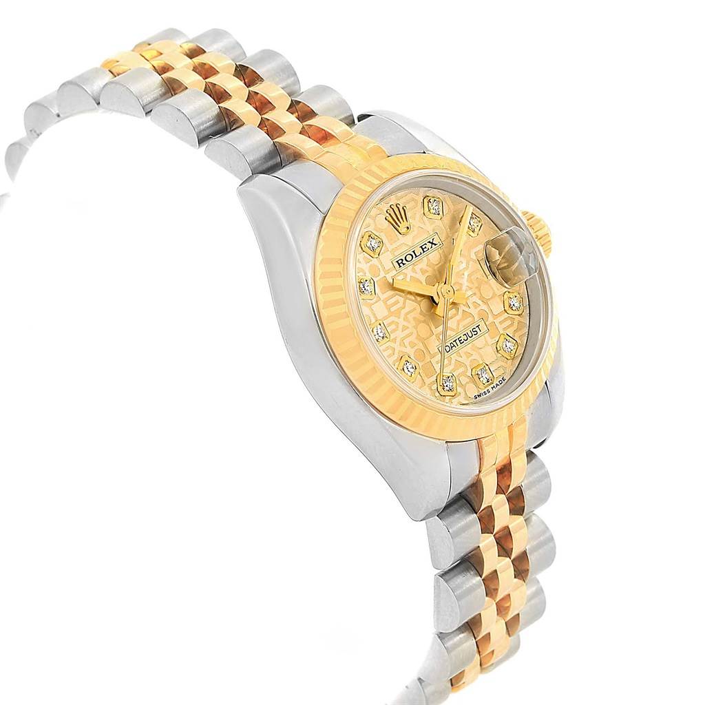 The image shows a side and partial front view of a Rolex Datejust 179173 Women's Steel and Gold (two tone) Champagne Dial 179173 Women's Steel and Gold (two tone) Champagne Dial watch, highlighting its two-tone bracelet, bezel, and dial.