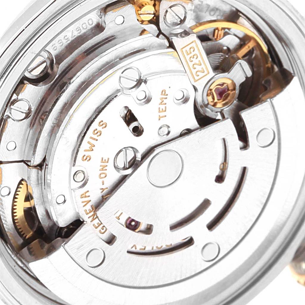 The image shows a close-up view of the movement mechanism from a Rolex Datejust 79173 Women's Steel and Gold (two tone) Black Dial 79173 Women's Steel and Gold (two tone) Black Dial watch.
