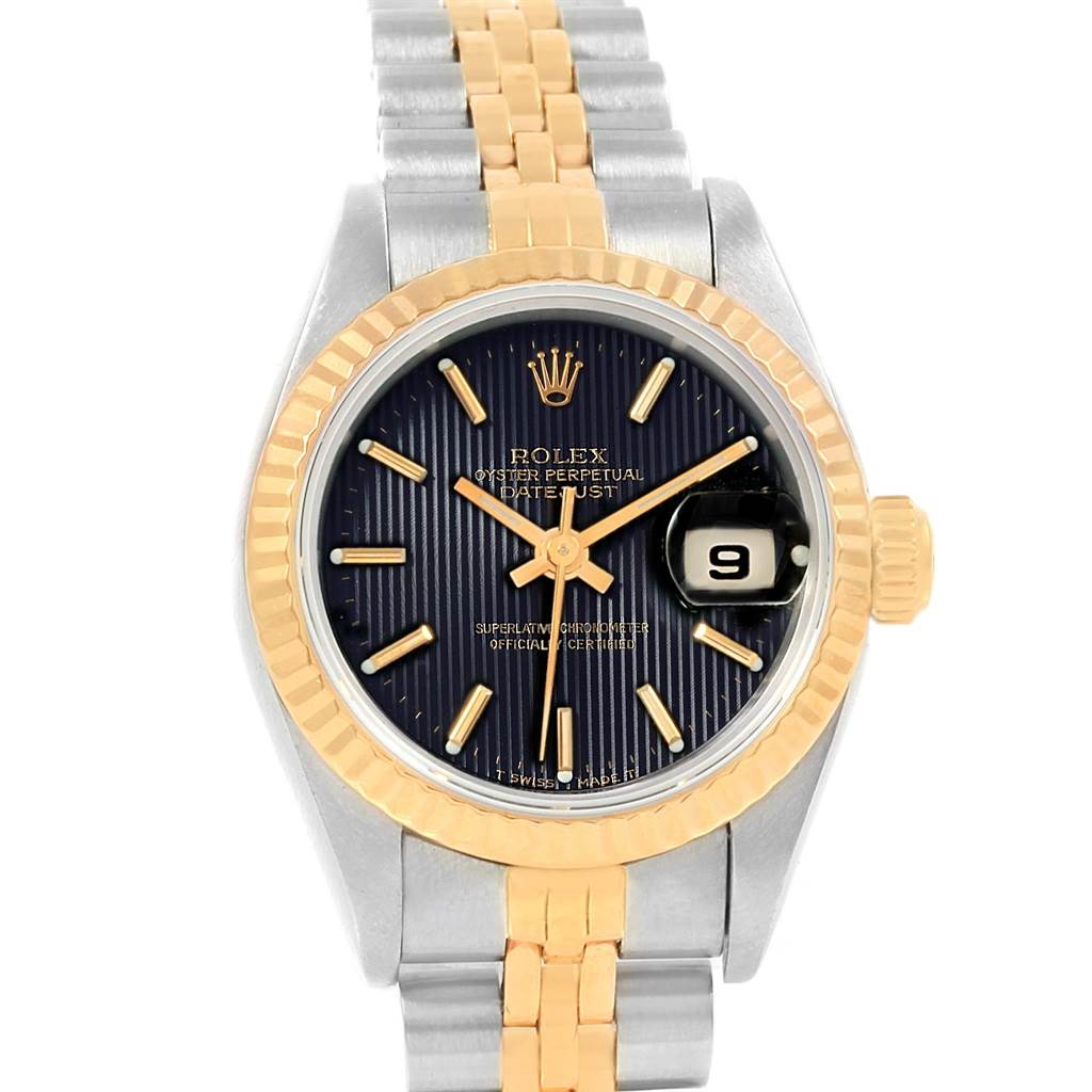 The image shows a front view of a Rolex Datejust 79173 Women's Steel and Gold (two tone) Black Dial 79173 Women's Steel and Gold (two tone) Black Dial watch, displaying the dial, fluted bezel, date window, and two-tone bracelet.