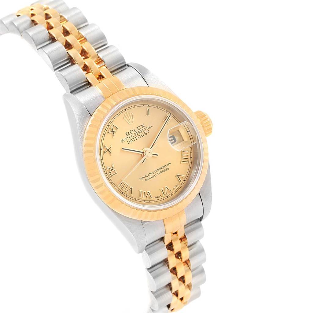 The image shows a Rolex Datejust 79173 Women's Steel and Gold (two tone) Champagne Dial 79173 Women's Steel and Gold (two tone) Champagne Dial watch angled from the right side, highlighting the dial, bezel, and bracelet.