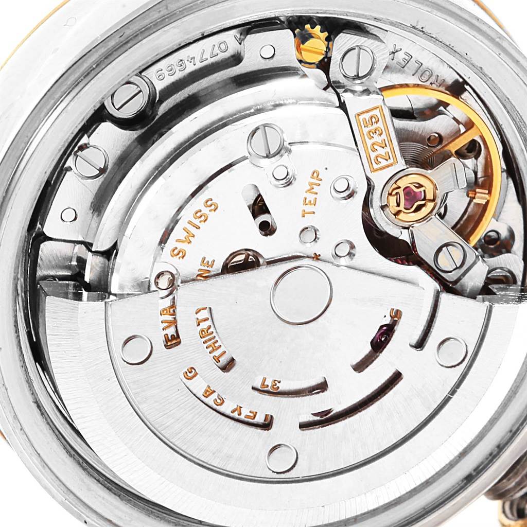 This image shows the internal mechanical movement of the Rolex Datejust 79173 Women's Steel and Gold (two tone) Champagne Dial 79173 Women's Steel and Gold (two tone) Champagne Dial watch from an angled close-up view.