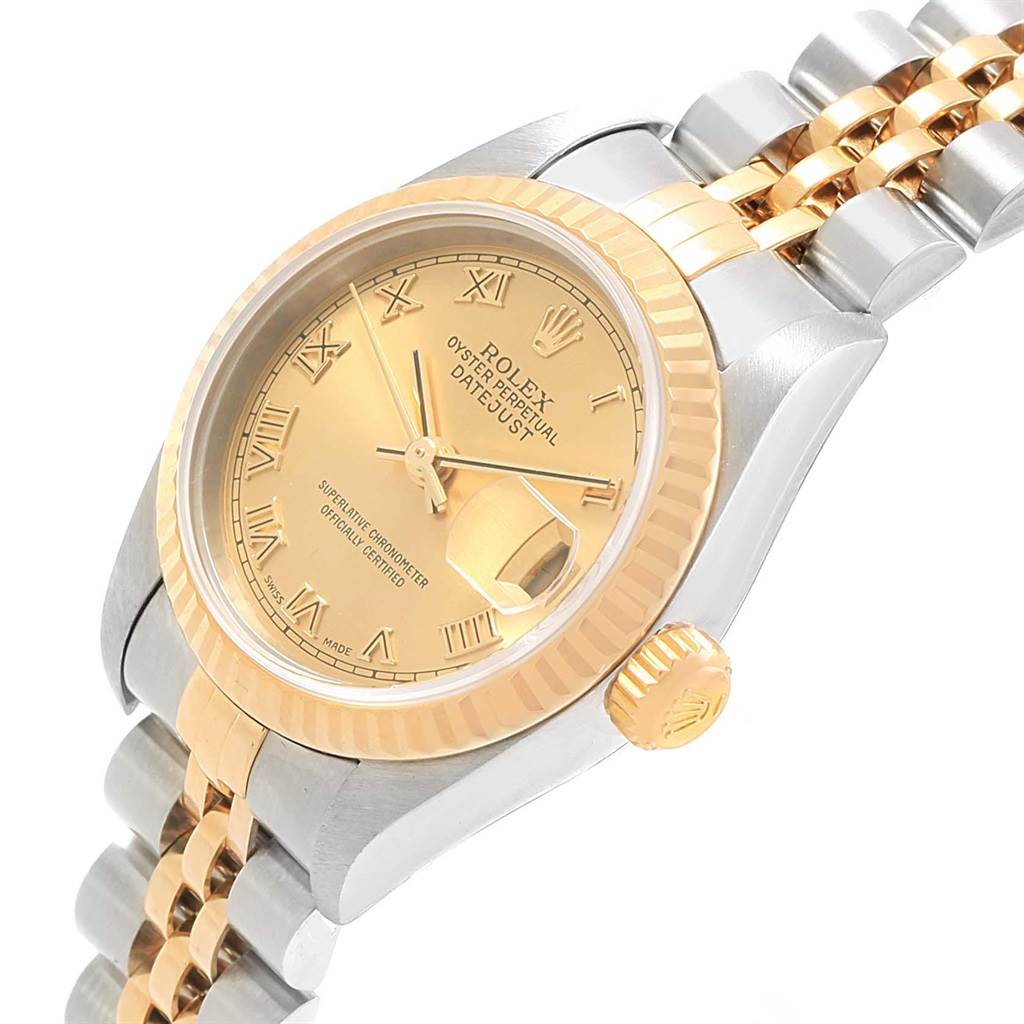This image shows a close-up, angled view of the Rolex Datejust 79173 Women's Steel and Gold (two tone) Champagne Dial 79173 Women's Steel and Gold (two tone) Champagne Dial watch featuring the dial, bezel, crown, and part of the bracelet.