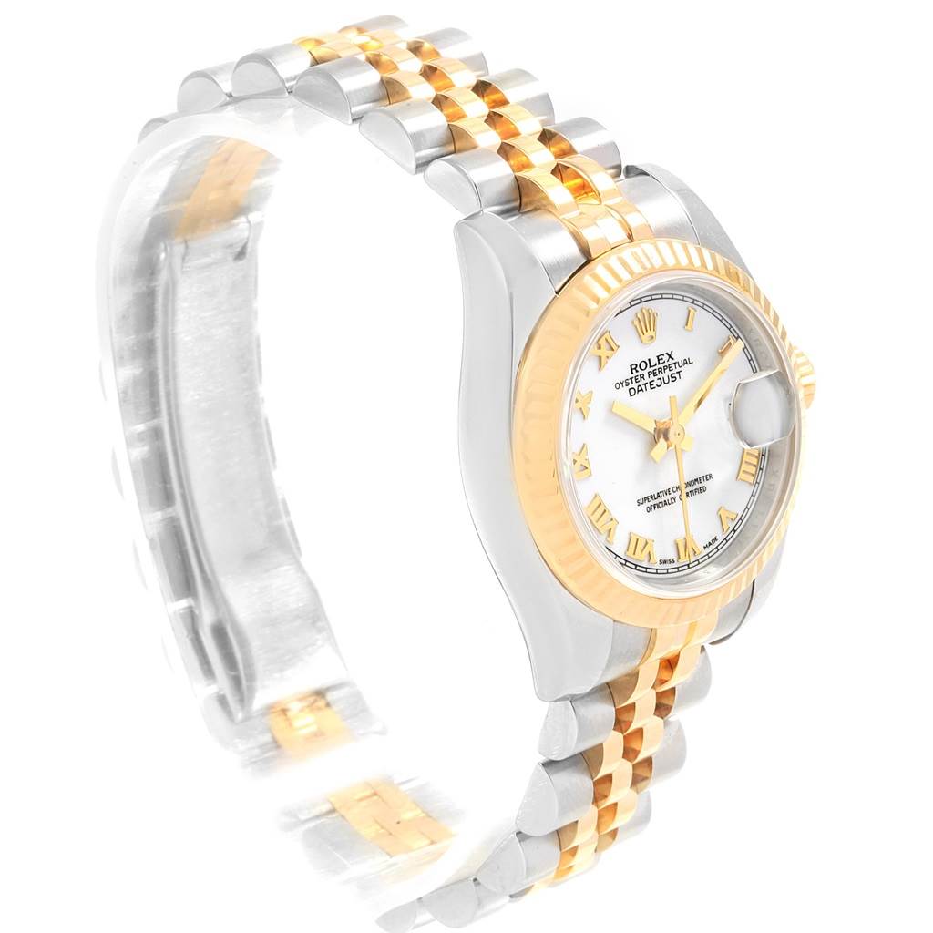 The image shows a Rolex Datejust 179173 Women's Steel and Gold (two tone) White Dial 179173 Women's Steel and Gold (two tone) White Dial watch from an angled side view, displaying the face, bezel, and part of the bracelet.
