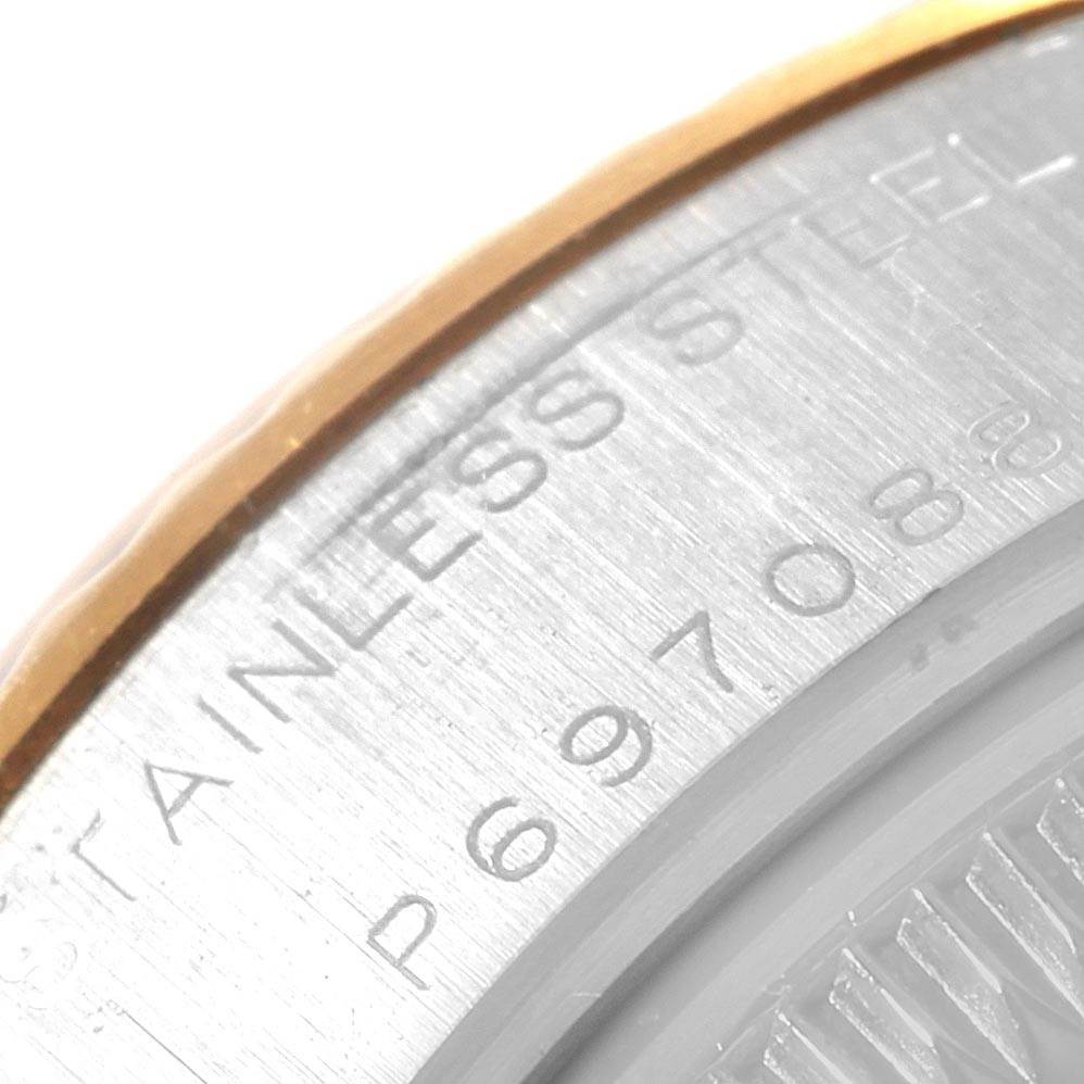 This close-up image shows the serial number and "Stainless Steel" engraving on the side of a Rolex Datejust 79173 Women's Steel and Gold (two tone) Grey Dial 79173 Women's Steel and Gold (two tone) Grey Dial watch case.
