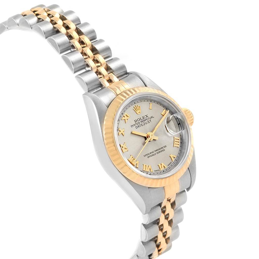 This image showcases the Rolex Datejust 79173 Women's Steel and Gold (two tone) Grey Dial 79173 Women's Steel and Gold (two tone) Grey Dial watch at a slightly angled side view, highlighting its two-tone bracelet, bezel, and dial.