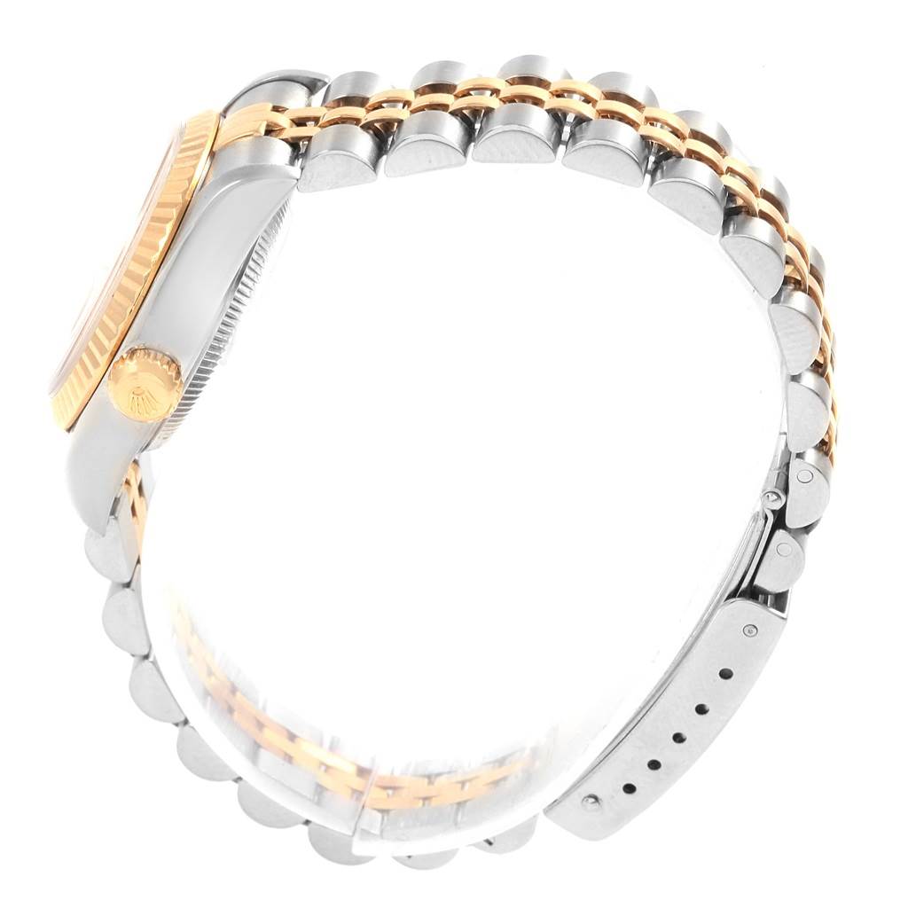 The image shows a side profile of a Rolex Datejust 79173 Women's Steel and Gold (two tone) Grey Dial 79173 Women's Steel and Gold (two tone) Grey Dial watch, highlighting the crown, case, and two-tone bracelet.
