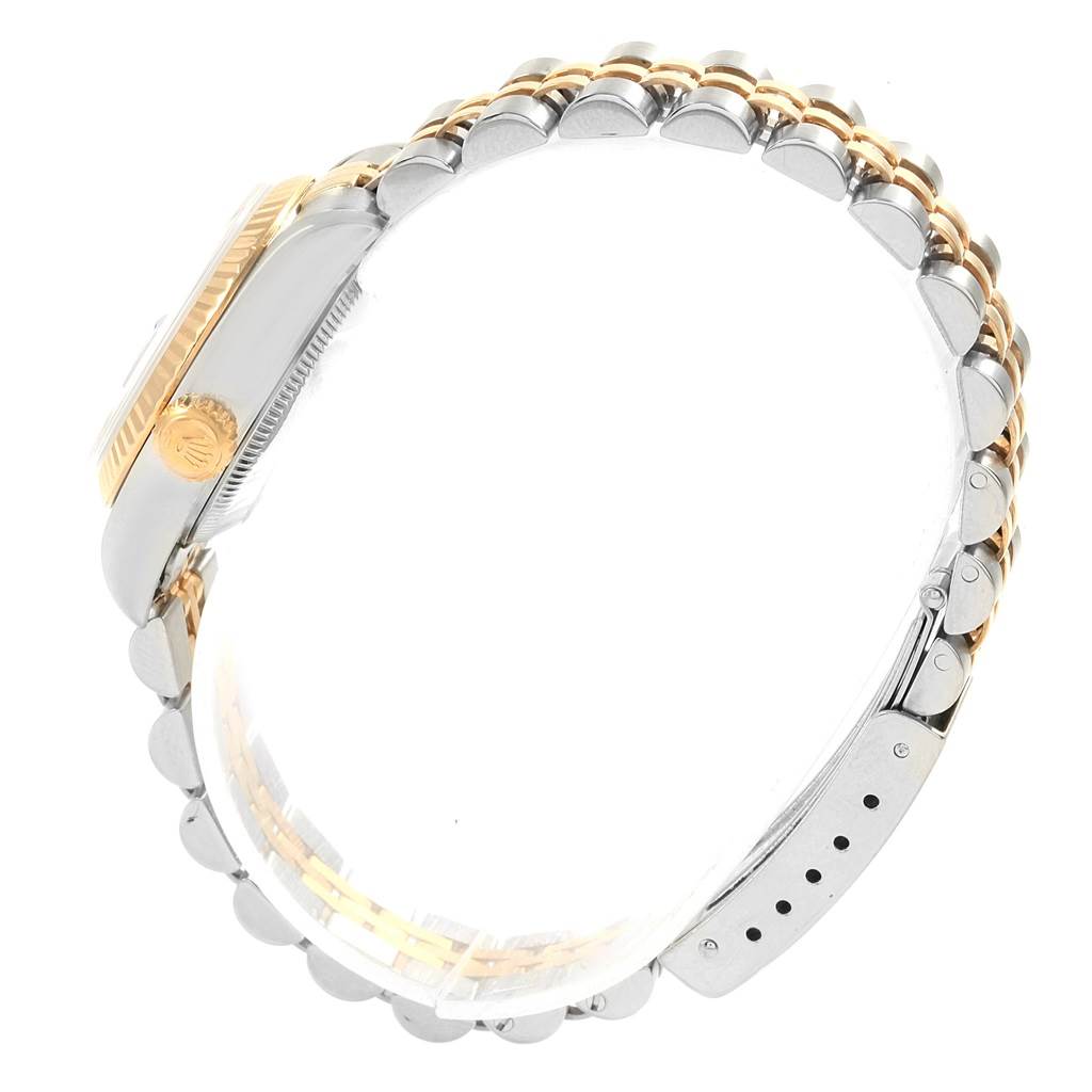 This image shows the side view of a Rolex Datejust 79173 Women's Stainless Steel Black Dial 79173 Women's Stainless Steel Black Dial watch, highlighting the crown, case, and bracelet.