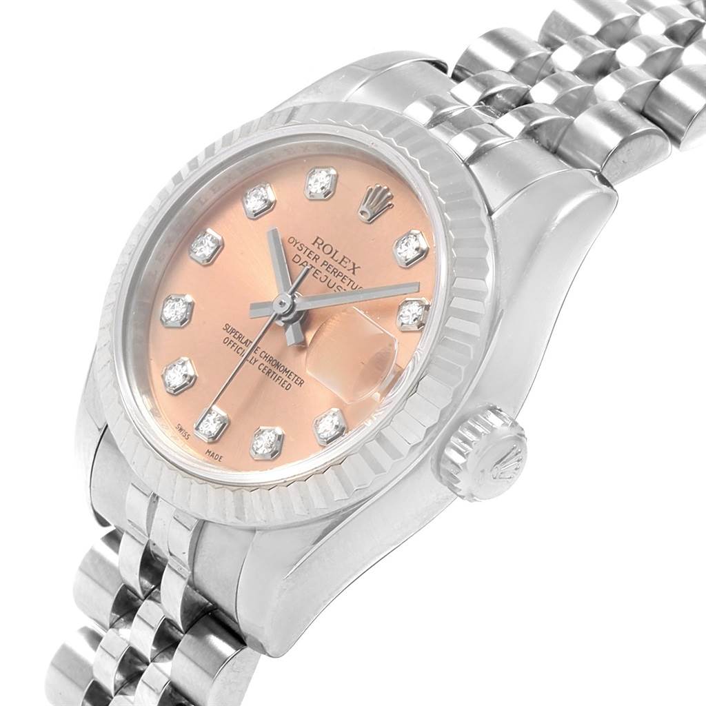 This image shows the Rolex Datejust 179174 Women
s Stainless Steel Pink Dial 179174 Women
s Stainless Steel Pink Dial watch from a slightly angled top view, highlighting the dial and part of the bracelet.