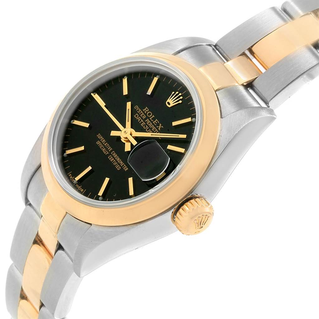 This image shows a close-up angle of a Rolex Datejust 79163 Women's Steel and Gold (two tone) Black Dial 79163 Women's Steel and Gold (two tone) Black Dial watch, highlighting the dial, bezel, crown, and part of the bracelet.