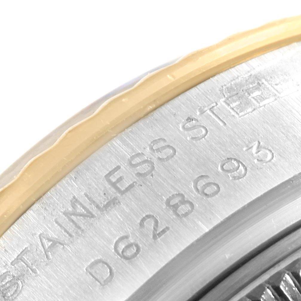 This is a close-up image showing the engraved stainless steel back casing of a Rolex Datejust 179173 Women's Steel and Gold (two tone) Mother of Pearl Dial 179173 Women's Steel and Gold (two tone) Mother of Pearl Dial watch.