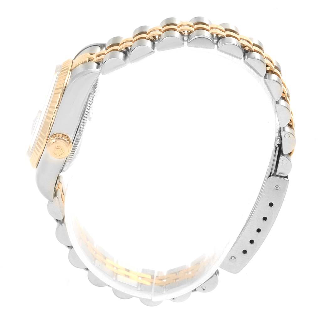 The image shows a Rolex Datejust 79173 Women's Stainless Steel Silver Dial 79173 Women's Stainless Steel Silver Dial watch from the side, highlighting its two-tone bracelet, crown, and part of the case.