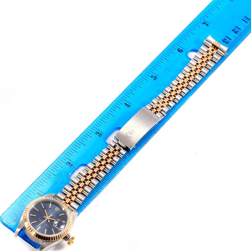 This image shows a Rolex Datejust 69173 Women's Steel and Gold (two tone) Blue Dial 69173 Women's Steel and Gold (two tone) Blue Dial watch laid flat, focusing on the face, bezel, bracelet, and clasp.