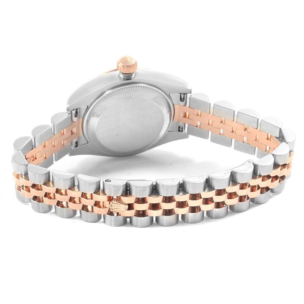 This image shows the back view of the Rolex Datejust 179171 Women
s Steel and Gold (two tone) Pink Dial 179171 Women
s Steel and Gold (two tone) Pink Dial watch, focusing on the case and two-tone bracelet with a crown logo.