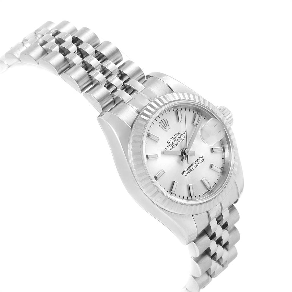 The image shows a side angle of a Rolex Datejust 179174 Women's Steel and Gold (two tone) Silver Dial 179174 Women's Steel and Gold (two tone) Silver Dial watch, highlighting the dial, bezel, crown, and part of the bracelet.