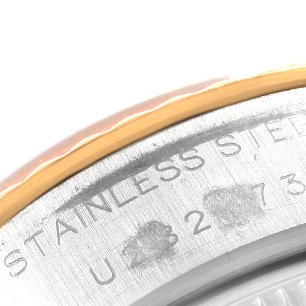This image shows a close-up of the case back and part of the bezel of a Rolex Datejust 69173 Women's Stainless Steel Black Dial 69173 Women's Stainless Steel Black Dial watch.