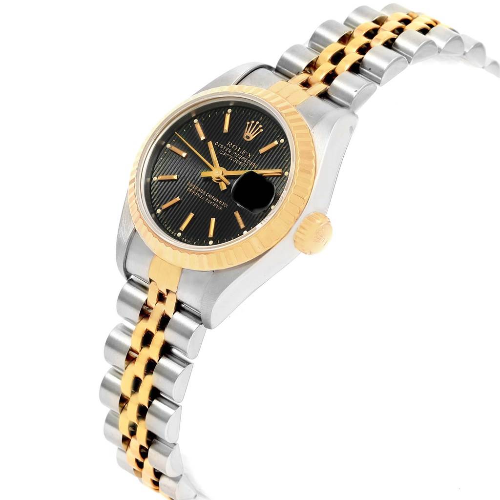 This image shows a Rolex Datejust 69173 Women's Stainless Steel Black Dial 69173 Women's Stainless Steel Black Dial watch from a front angle, highlighting the gold and silver bracelet, black dial, and fluted bezel.