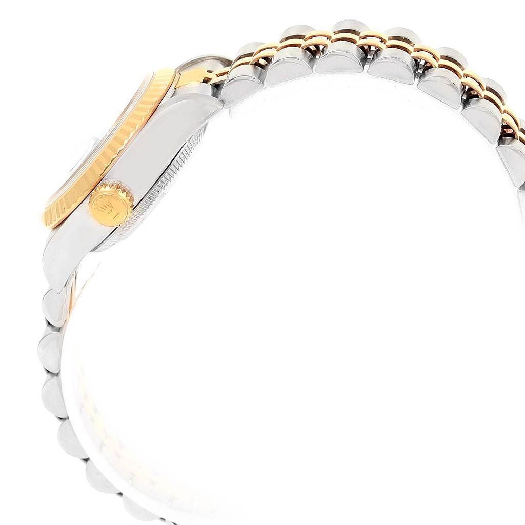 The image shows a side view of a Rolex Datejust 69173 Women's Stainless Steel Black Dial 69173 Women's Stainless Steel Black Dial watch, highlighting the crown, bezel, and part of the two-tone bracelet.