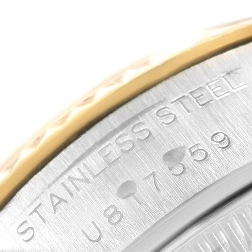 The image shows a close-up of the stainless steel and gold bezel of a Rolex Datejust 69173 Women's Stainless Steel Grey Dial 69173 Women's Stainless Steel Grey Dial watch.