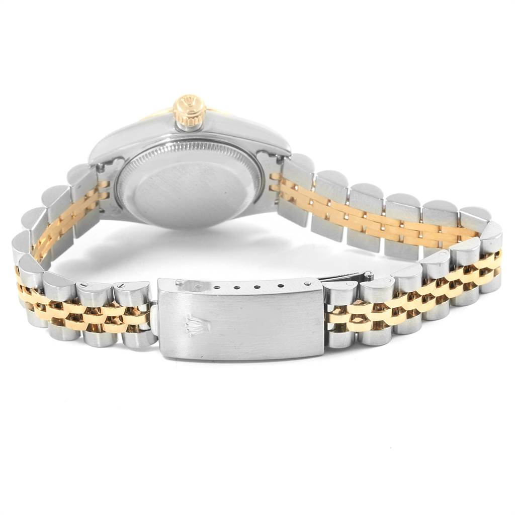 The image shows the back of a Rolex Datejust 69173 Women
s Stainless Steel Beige Dial 69173 Women
s Stainless Steel Beige Dial watch, highlighting the case back, crown, and dual-tone bracelet with clasp.