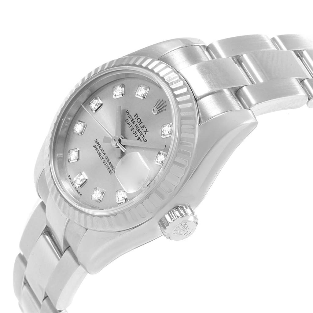 The image shows a Rolex Datejust 179174 Women
s Stainless Steel Silver Dial 179174 Women
s Stainless Steel Silver Dial watch at an angle highlighting the dial, bezel, crown, and part of the bracelet.
