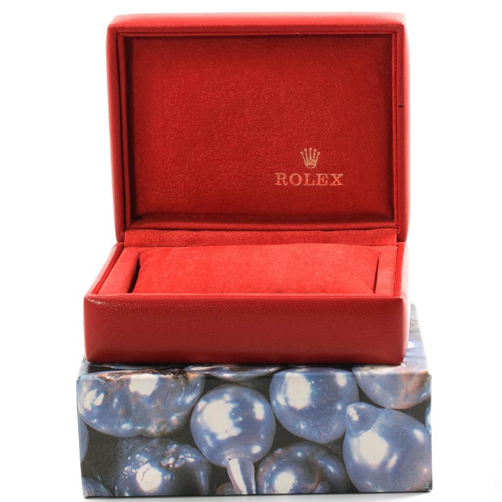 The image shows a red Rolex Datejust 69173 Women's Stainless Steel Beige Dial 69173 Women's Stainless Steel Beige Dial watch box with the brand's logo inside, positioned at a front view.