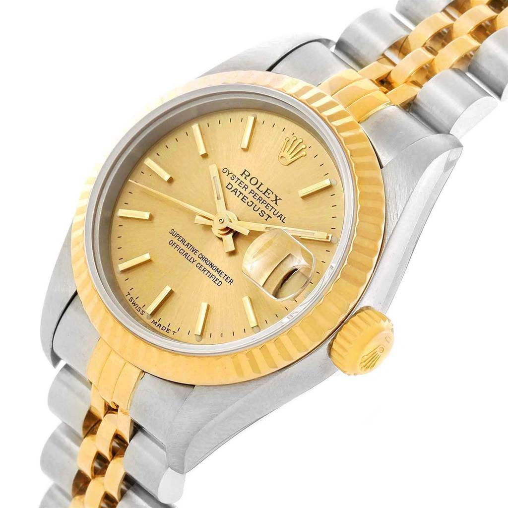 The image shows a Rolex Datejust 79173 Women's Steel and Gold (two tone) Champagne Dial 79173 Women's Steel and Gold (two tone) Champagne Dial watch at a slight side angle, highlighting the dial, bezel, crown, and part of the bracelet.