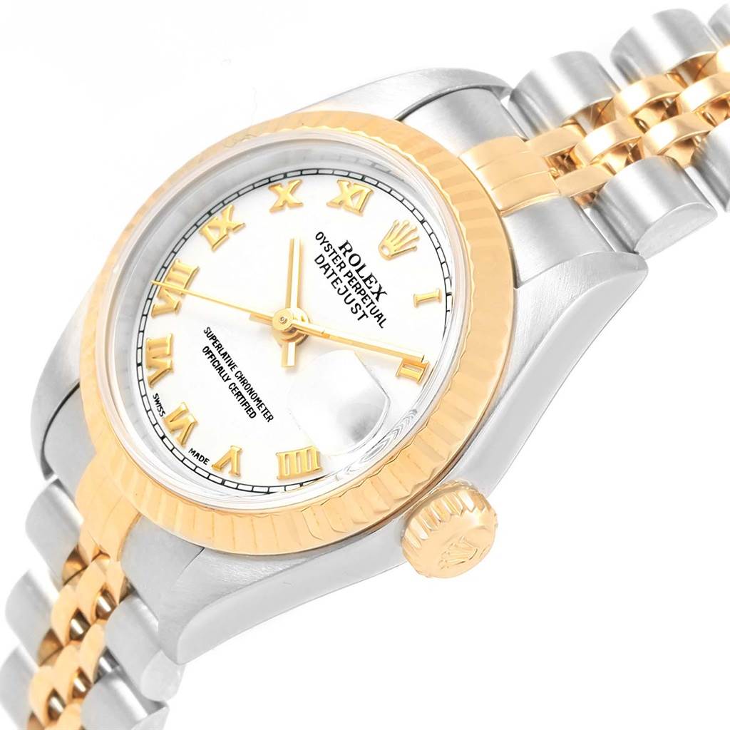 This image shows a Rolex Datejust 79173 Women's Steel and Gold (two tone) White Dial 79173 Women's Steel and Gold (two tone) White Dial watch angled to highlight the face, crown, bezel, and part of the bracelet.