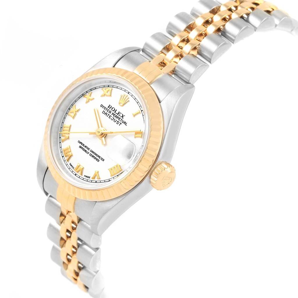 The image shows a Rolex Datejust 79173 Women's Steel and Gold (two tone) White Dial 79173 Women's Steel and Gold (two tone) White Dial watch featuring its face, crown, and partial two-tone bracelet at a front-side angle.