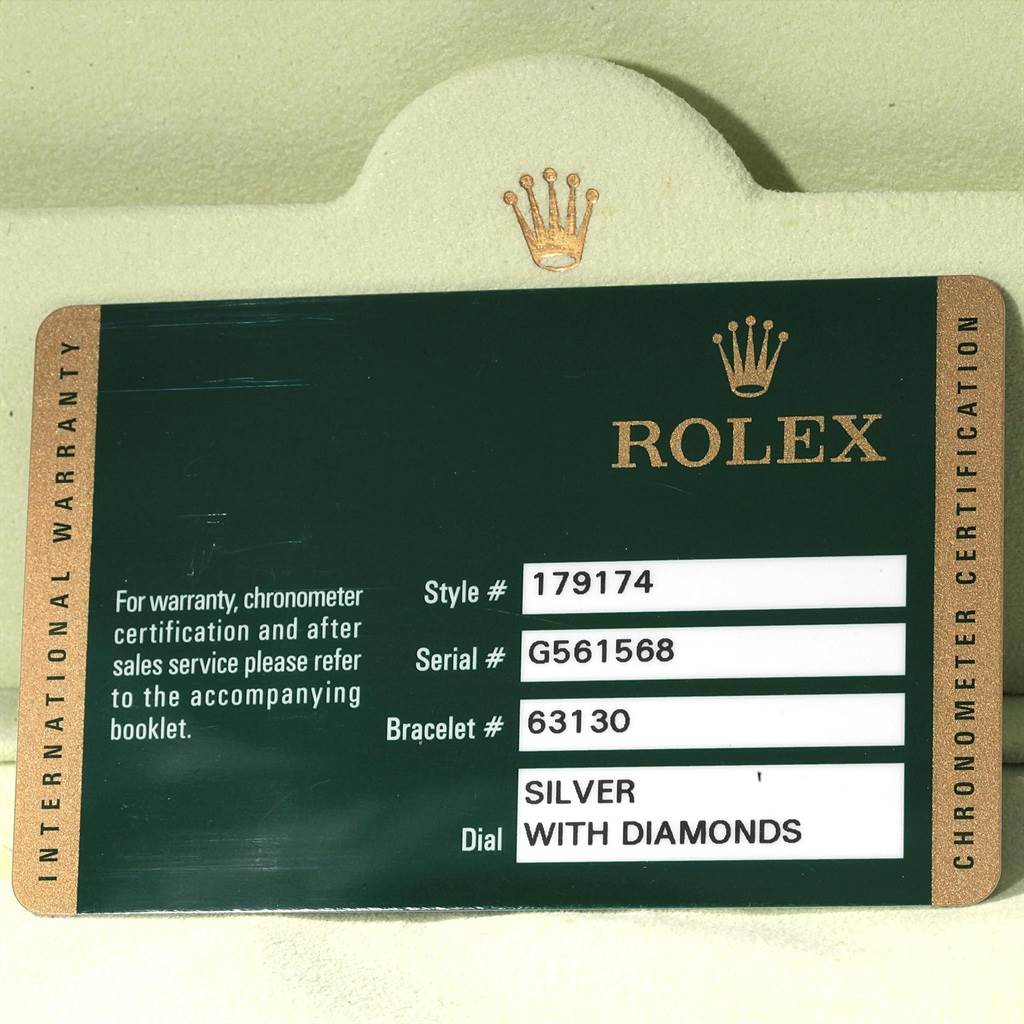 The image shows a warranty and certification card for a Rolex Datejust 179174 Women
s Stainless Steel Silver Dial 179174 Women
s Stainless Steel Silver Dial model, detailing style, serial, bracelet numbers, and dial description.