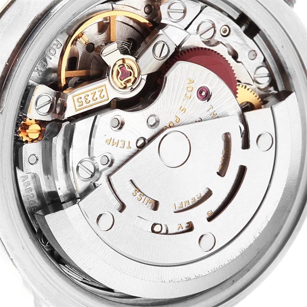 This image shows a close-up of the internal mechanisms of the Rolex Datejust 179174 Women
s Stainless Steel Silver Dial 179174 Women
s Stainless Steel Silver Dial watch, specifically the movement components.