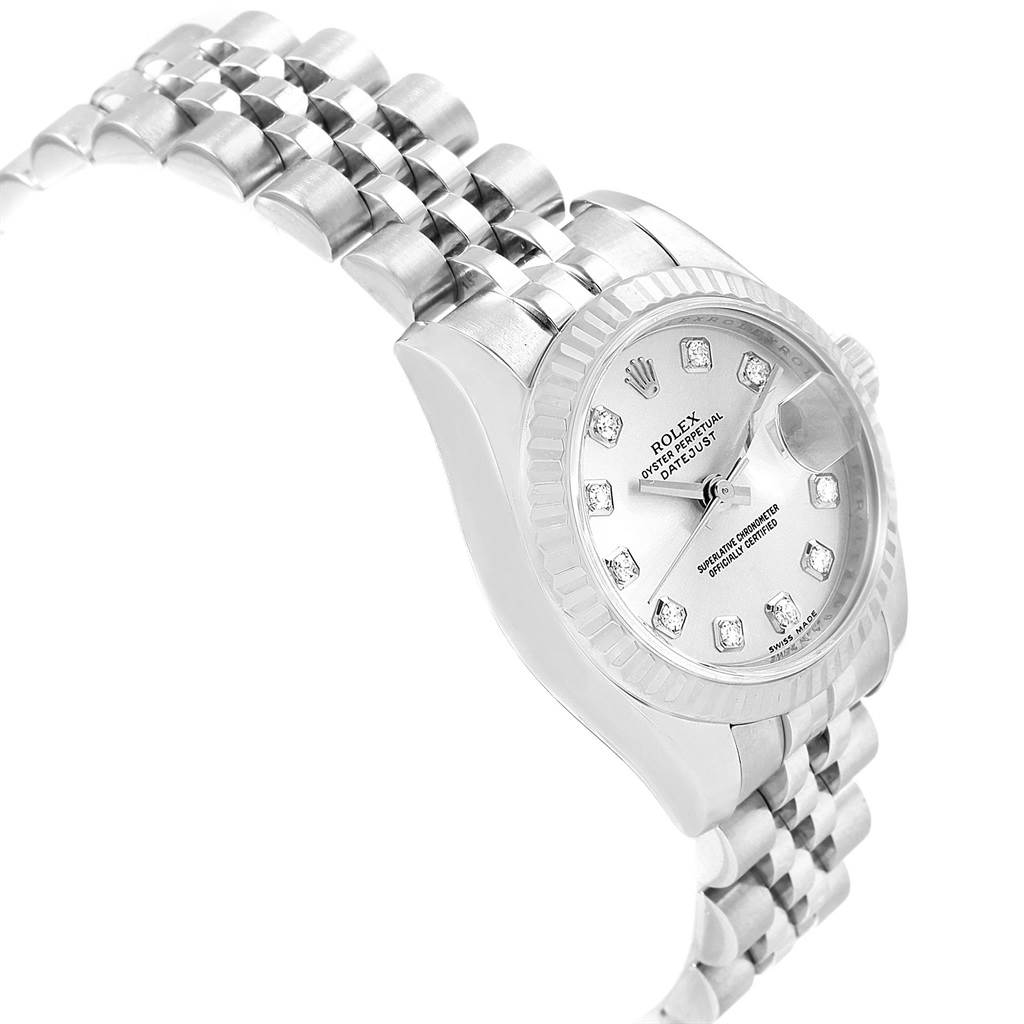 This image shows a Rolex Datejust 179174 Women
s Stainless Steel Silver Dial 179174 Women
s Stainless Steel Silver Dial watch at an angle that highlights the bracelet and part of the face with diamond markers.