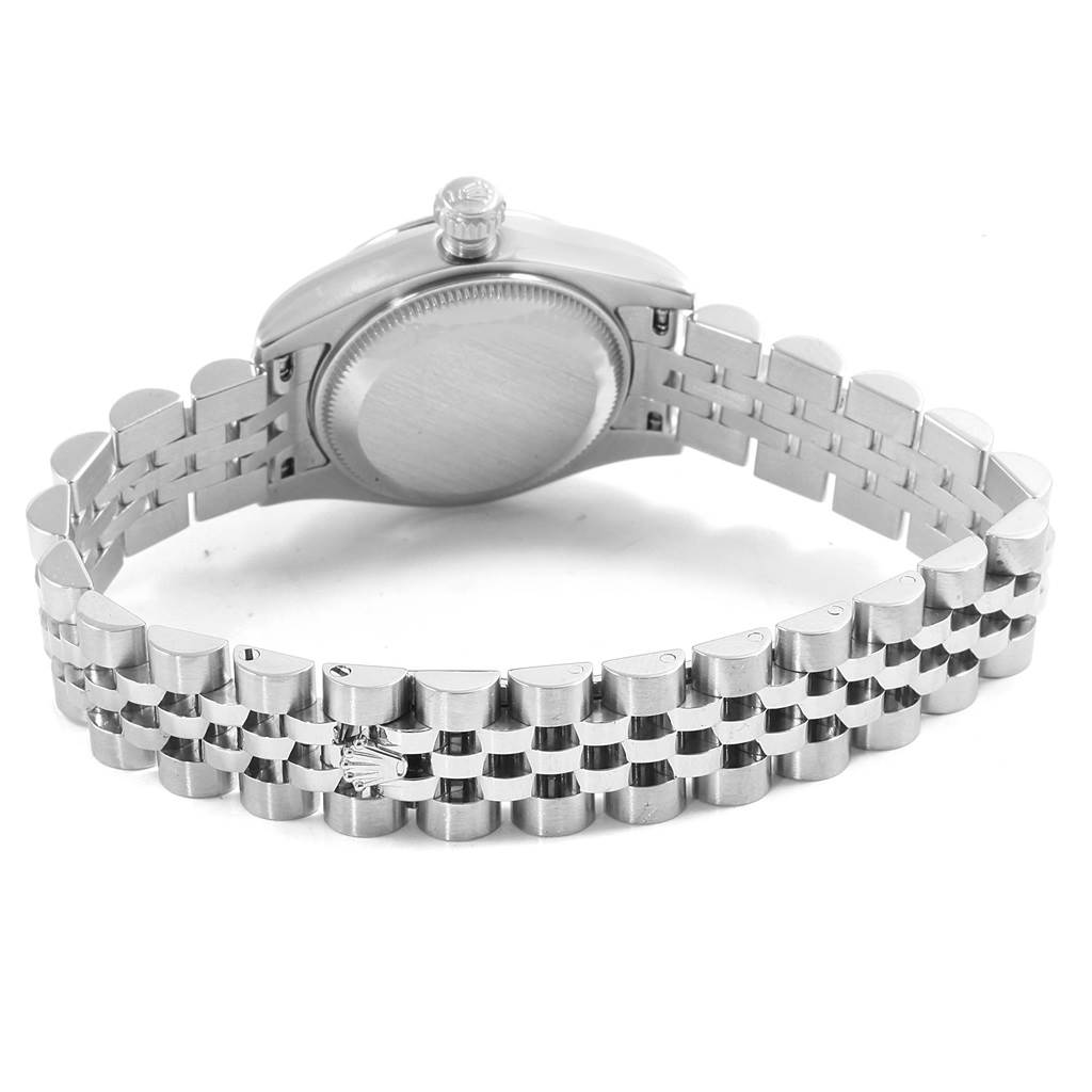 The image shows the back view of a Datejust model by Rolex, focusing on the case back and bracelet.