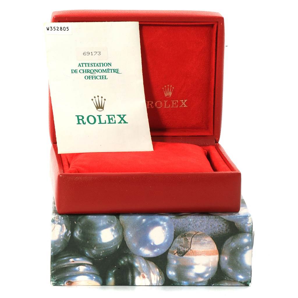 The image shows a Rolex Datejust 69173 Women
s Stainless Steel Silver Dial 69173 Women
s Stainless Steel Silver Dial watch box, documentation, and cushion at a front-angle view.