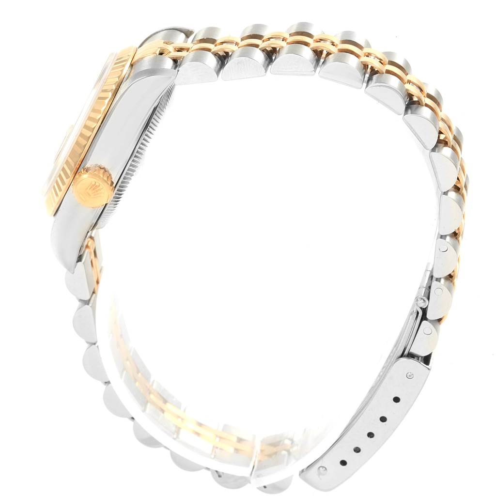 This image shows a side view of a Rolex Datejust 69173 Women
s Stainless Steel Silver Dial 69173 Women
s Stainless Steel Silver Dial watch, featuring the crown and bracelet.