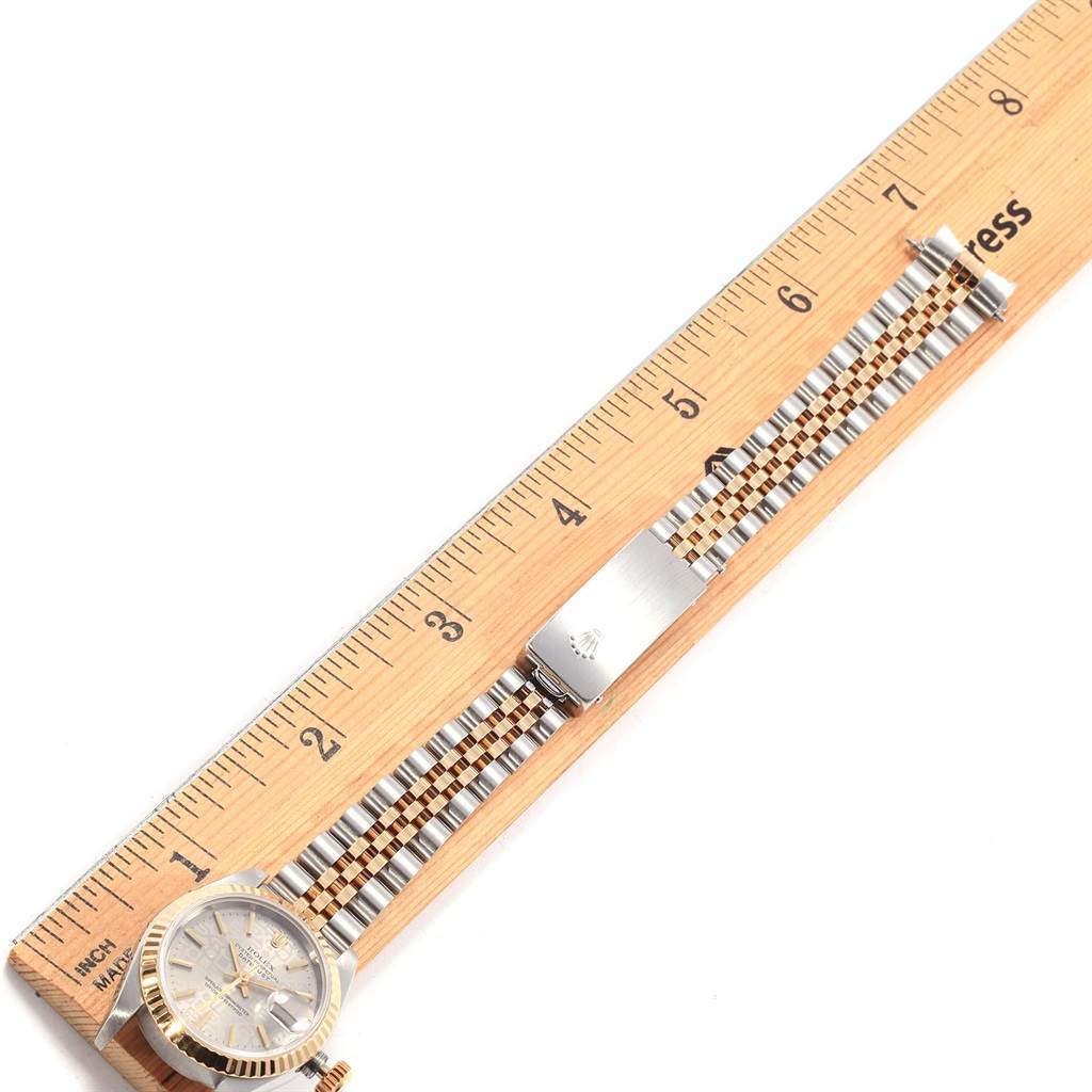 This image shows the Rolex Datejust 69173 Women
s Stainless Steel Silver Dial 69173 Women
s Stainless Steel Silver Dial watch from a top-down angle, highlighting the dial, fluted bezel, and Jubilee bracelet.