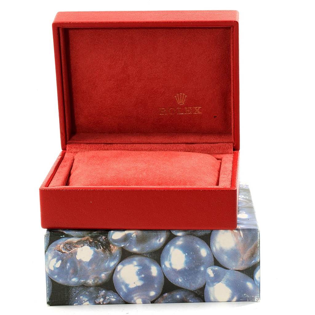 The image shows a Rolex Datejust 79173 Women's Steel and Gold (two tone) Grey Dial 79173 Women's Steel and Gold (two tone) Grey Dial watch box with a red velvet interior and the Rolex logo embossed inside.