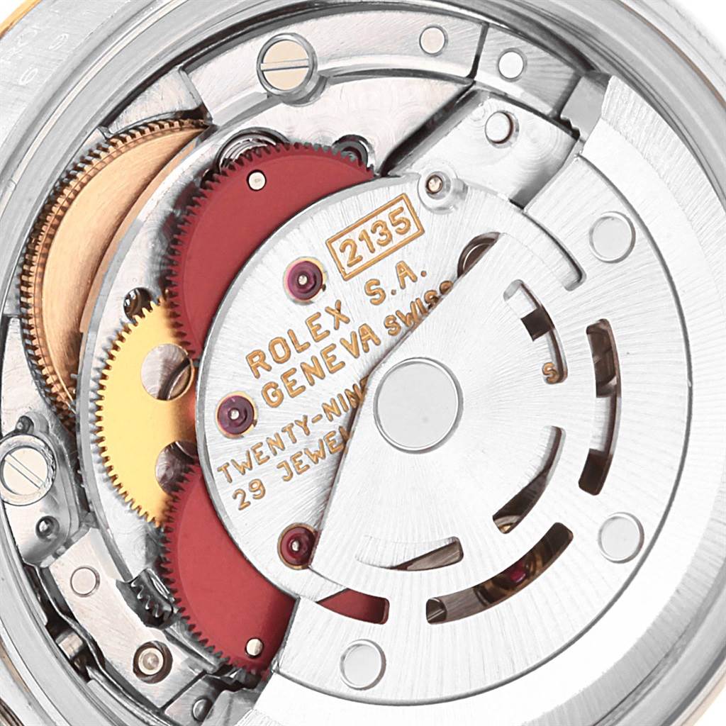 This image shows the intricate internal movement of a Rolex Datejust 69173 Women's Stainless Steel Beige Dial 69173 Women's Stainless Steel Beige Dial model up close.