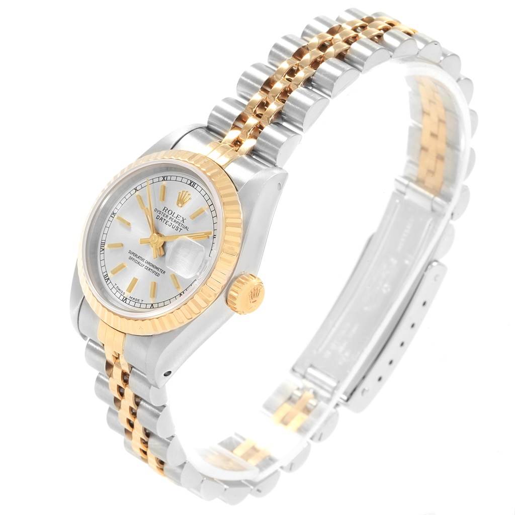 This image shows a Rolex Datejust 69173 Women's Stainless Steel Silver Dial 69173 Women's Stainless Steel Silver Dial watch from a side angle, highlighting the bezel, dial, crown, and bracelet.