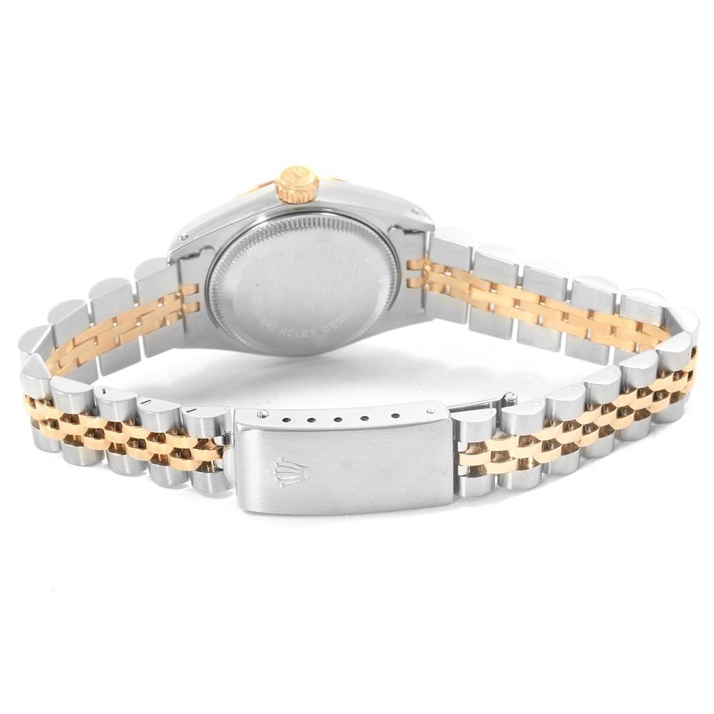 This image shows the back view of a Rolex Datejust 69173 Women's Stainless Steel Silver Dial 69173 Women's Stainless Steel Silver Dial watch, highlighting the clasp, bracelet, case back, and crown.