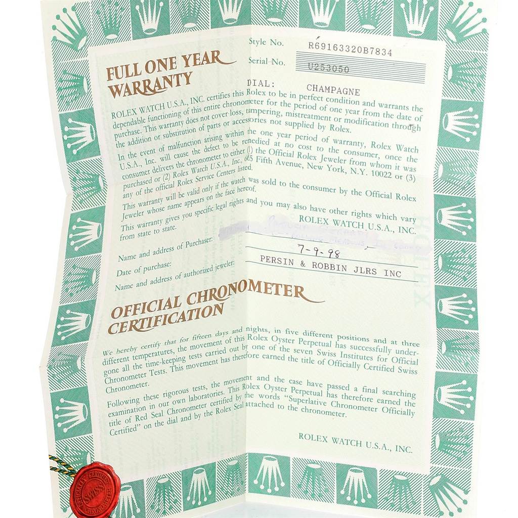 This image shows the warranty and chronometer certification paperwork for a Rolex Datejust 69163 Women's Stainless Steel Champagne Dial 69163 Women's Stainless Steel Champagne Dial model.