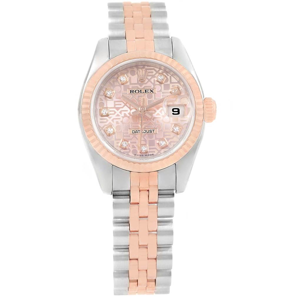 This Rolex Datejust 179171 Women's Steel and Gold (two tone) Pink Dial 179171 Women's Steel and Gold (two tone) Pink Dial is shown in a top-down angle, displaying its pink dial, diamond markers, two-tone bracelet, and date window.