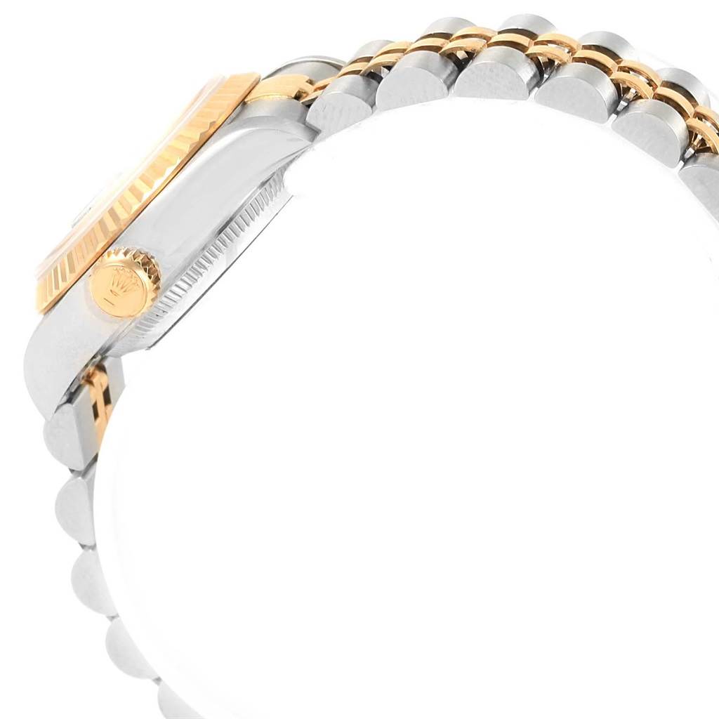 The image shows a side view of the casing and crown of a Rolex Datejust 69173 Women's Stainless Steel Beige Dial 69173 Women's Stainless Steel Beige Dial watch, along with part of its two-tone bracelet.