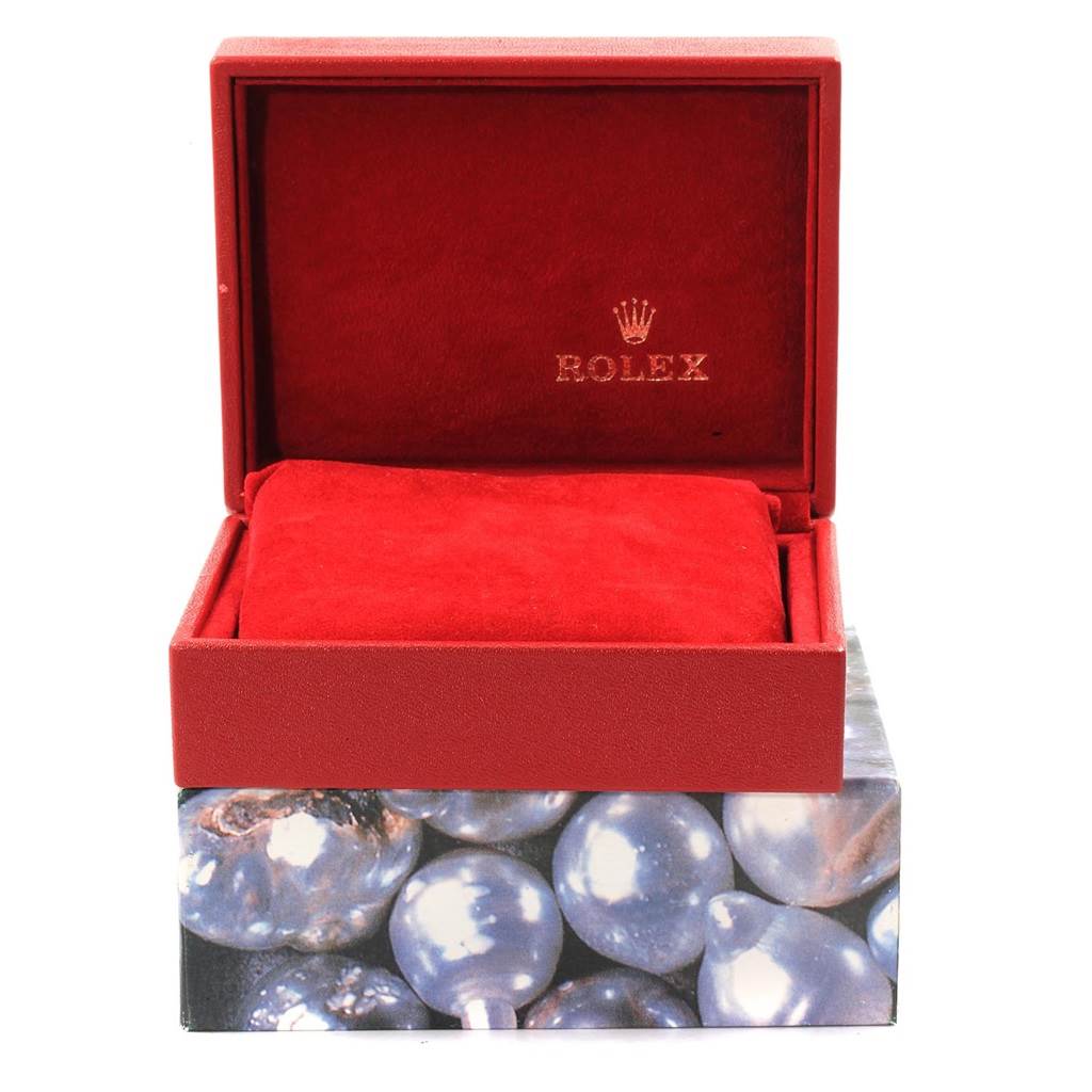 The image shows an open Rolex Datejust 69173 Women's Stainless Steel Beige Dial 69173 Women's Stainless Steel Beige Dial watch box in red color, with a cushion inside.