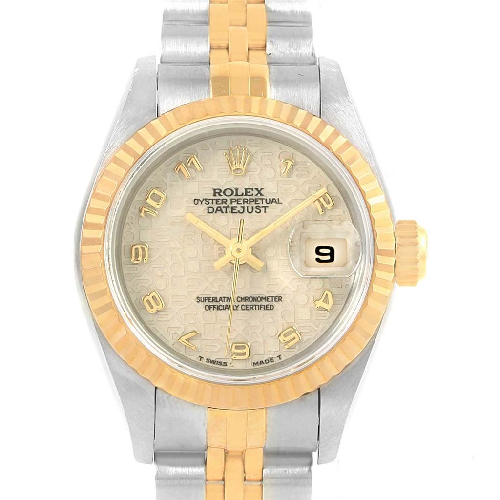 The Rolex Datejust 69173 Women's Stainless Steel Beige Dial 69173 Women's Stainless Steel Beige Dial watch is shown from a top-down angle, displaying its dial, bezel, case, and part of the bracelet.