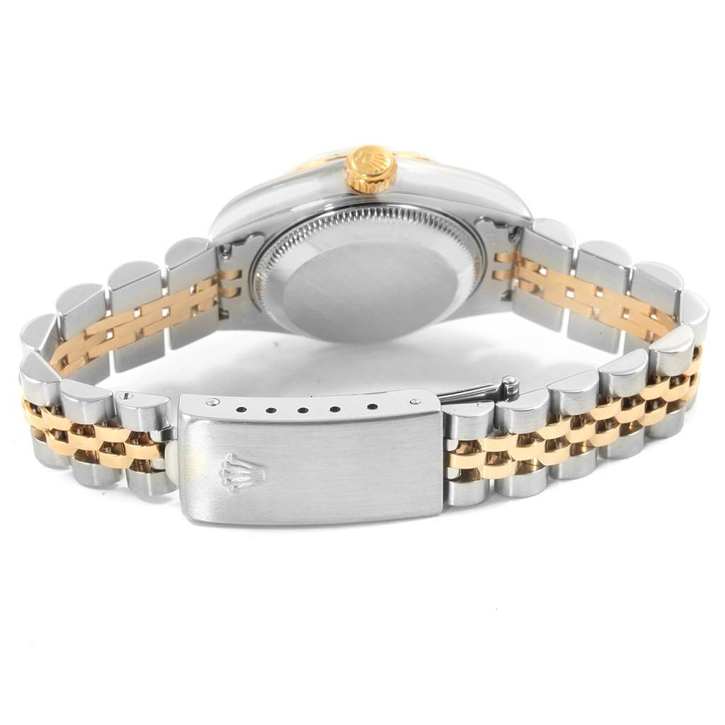 The image shows the back view of a Rolex Datejust 79173 Women's Stainless Steel Black Dial 79173 Women's Stainless Steel Black Dial model watch, highlighting its case back and two-tone bracelet.