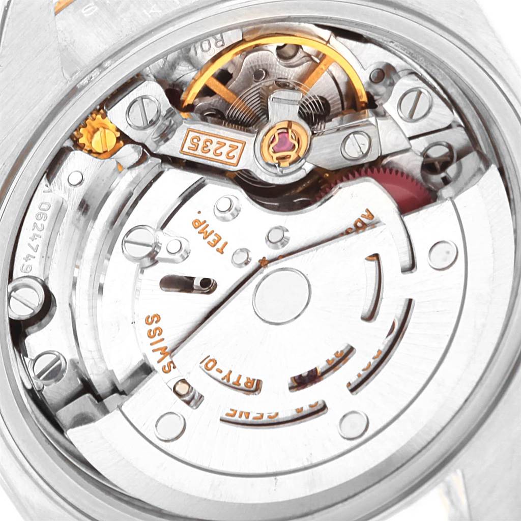 The image shows a detailed view of the internal mechanics of a Rolex Datejust 79173 Women's Stainless Steel Black Dial 79173 Women's Stainless Steel Black Dial watch.