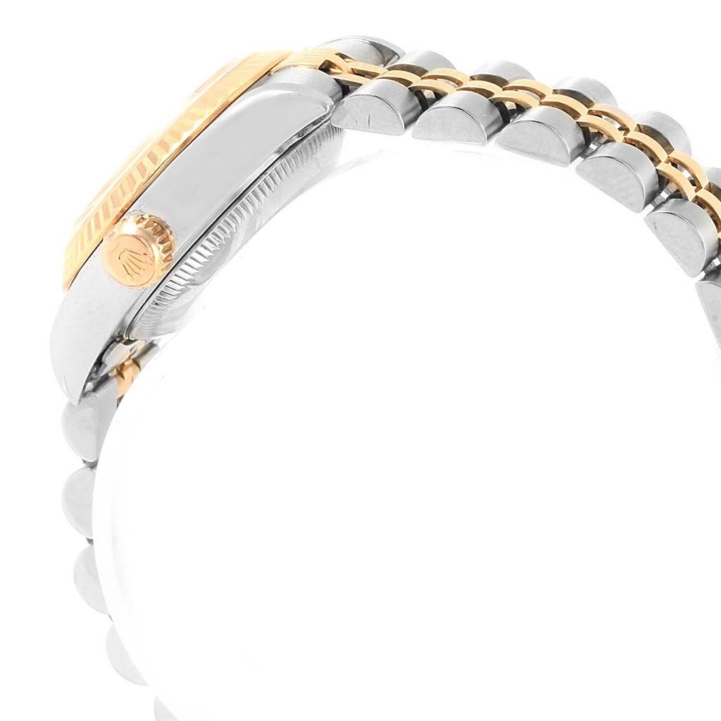 The image shows a side view of a Rolex Datejust 79173 Women's Stainless Steel Black Dial 79173 Women's Stainless Steel Black Dial watch, highlighting the crown, case, and part of the two-tone bracelet.