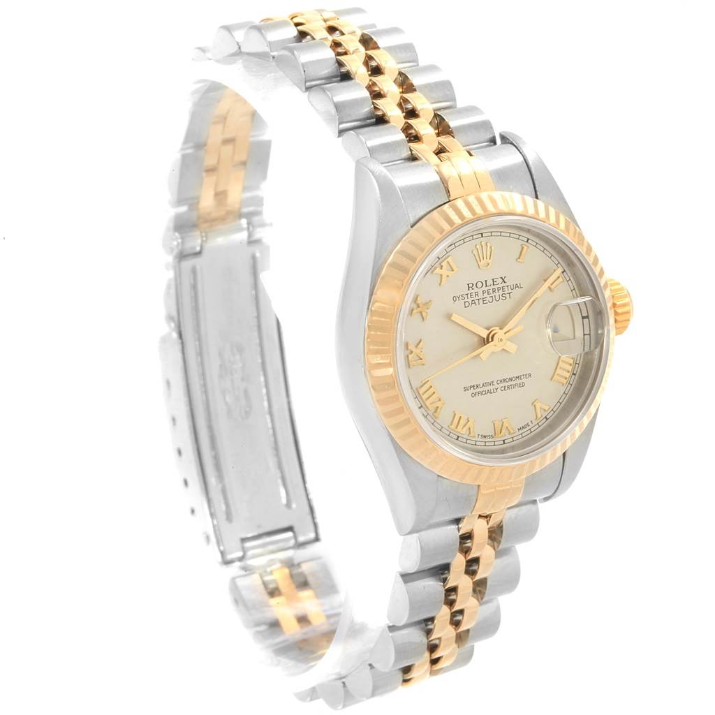 This image shows the face, fluted bezel, and Jubilee bracelet of a Rolex Datejust 69173 Women's Stainless Steel Beige Dial 69173 Women's Stainless Steel Beige Dial watch at a slight angle.