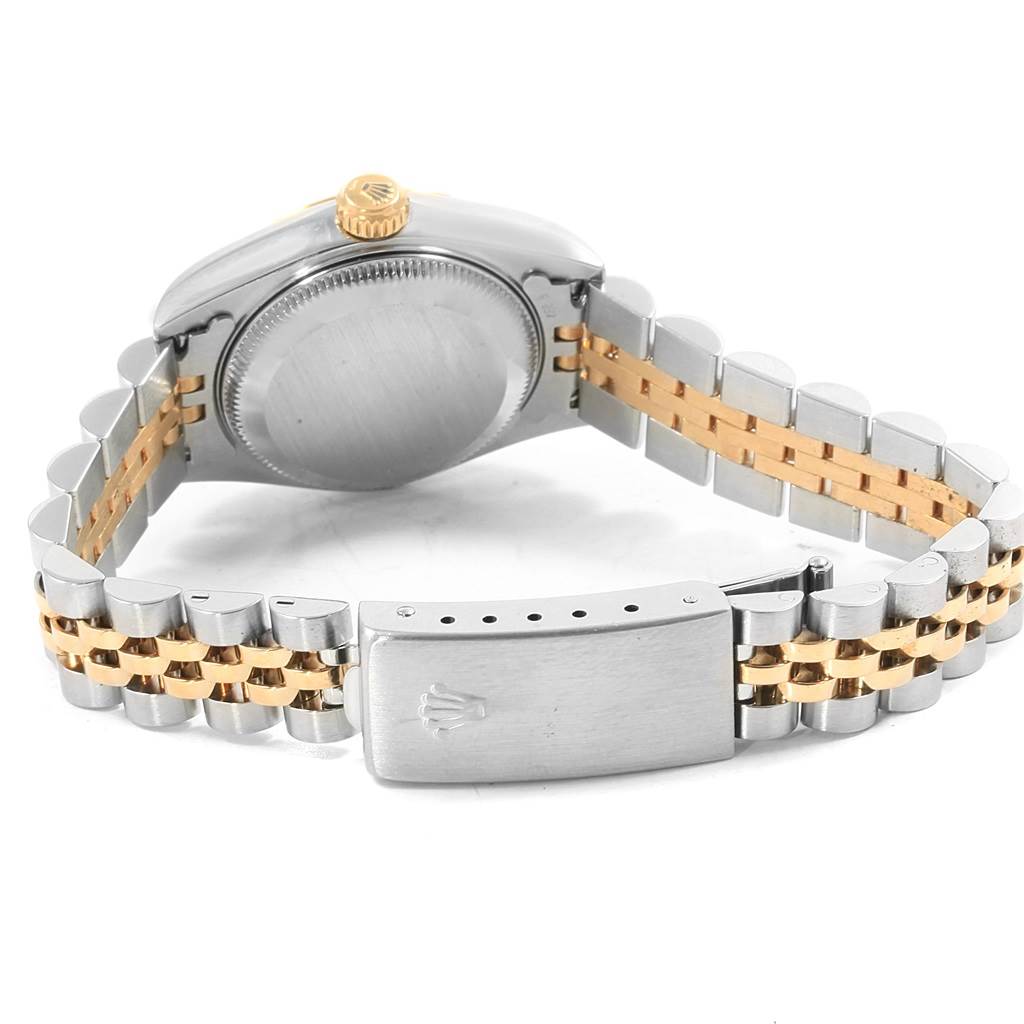 The image shows the back and side view of a Rolex Datejust 79173 Women's Steel and Gold (two tone) White Dial 79173 Women's Steel and Gold (two tone) White Dial watch, highlighting its case back, crown, and bracelet with clasp.
